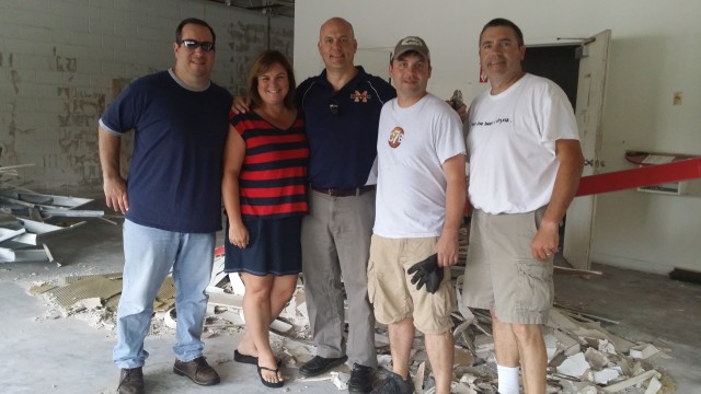 Owners Tim O'Brien and Drew Stephenson show the future home of Pleasure House Brewing to representatives of The Beer Club for Men, Barley's Angles, and Homebrew USA