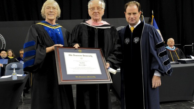 Old Dominion University provost Carol Simpson and President John Broderick present an honorary doctorate to composer John Duffy (photo courtesy of ODU)