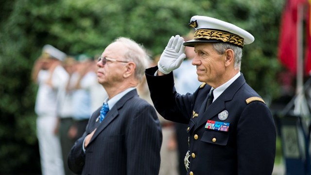 NORFOLK, Va. (July 2, 2015) - - French Air Force Gen. Jean-Paul Paloméros, Supreme Allied Commander Transformation, and Mr. Wolfgang Yagen salute the National Ensign as it is raised at a ceremony in honor of Independence Day on Naval Support Activity Hampton Roads, July 2. Allied Command Transformation, located in Norfolk, Va., is the only NATO Headquarters outside of Europe and recognizes all 28 NATO Alliance countries during their respective national days. (NATO photo by Mass Communication Specialist 1st Class Stephen Oleksiak/Released)